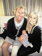 NEW TEST: Springbok flank Schalk Burger with his wife Michele and baby Schalk, who was born in Cape Town on August 20 Picture: SUPPLIED .