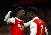 Arsenal's Eddie Nketiah celebrates scoring their third goal with Bukayo Saka.