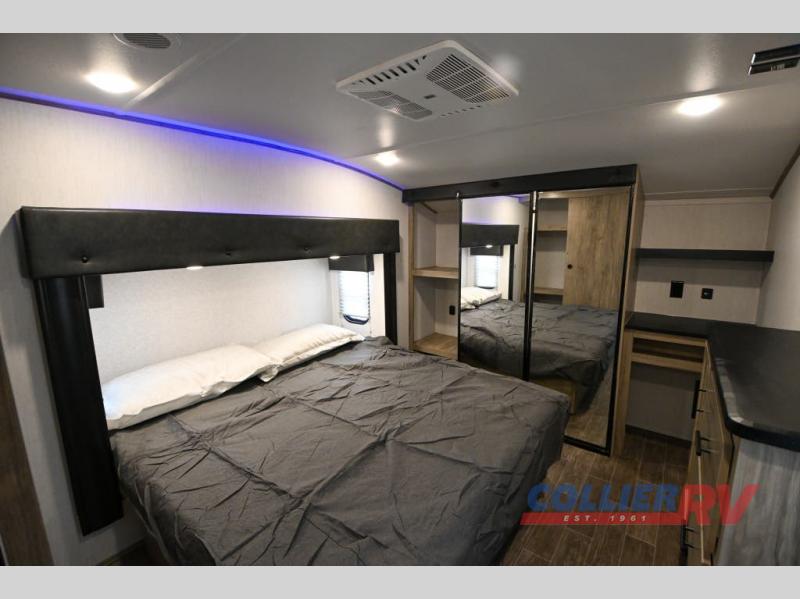Master bedroom in the Forest River Cherokee Arctic Wolf Suite fifth wheel