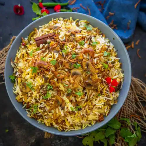 Nawabi Mushroom Dum Biryani With Raita