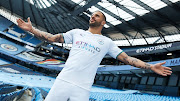 Kyle Walker models the new City away kit.