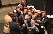 Newly elected Johannesburg mayor Geoff Makhubo is congratulated by members of the ANC on Wednesday.