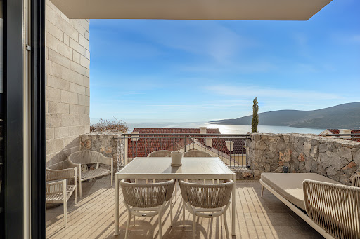Buy this luxury house in Tivat (Montenegro) - Terrace with furniture, sea and mountain view