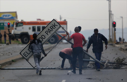 Eldorado Park residents clash with police during violent protests on May 08, 2017 in Johannesburg, South Africa. Residents demanded better service delivery, housing and more employment opportunities.