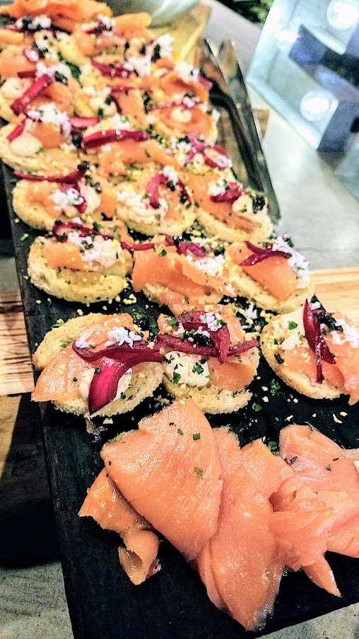 Steelhead rye toast with chipotle cream and hibiscus, pickled onions, sift egg, caviar from King Tide Fish and Shell