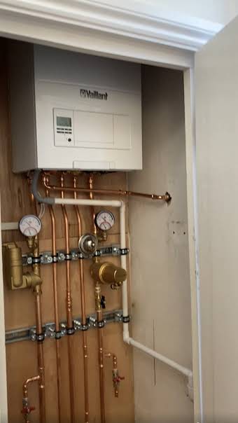 Boiler conversion from an unvented, hot water cylinder to a Combi boiler album cover