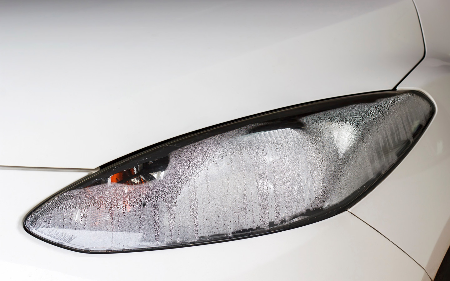 water vapours inside car headlight