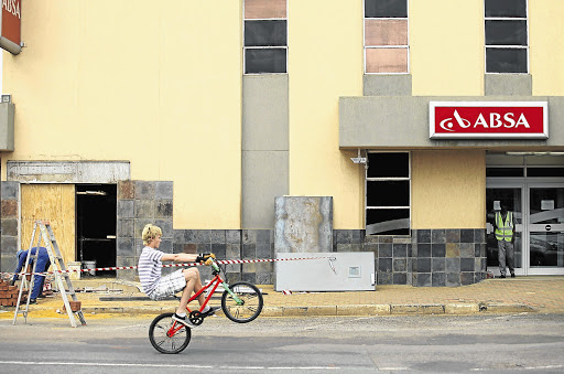 CASH IN A FLASH: Only a hole in the wall remains of the Absa ATM in Koster after it was bombed Picture: KEVIN SUTHERLAND