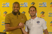 Captain Itumeleng Khune of Kaizer Chiefs with Captain Dean Furman of SuperSport United during the Kaizer Chiefs MTN 8 press conference at PSL Offices on August 10, 2017 in Johannesburg, South Africa.