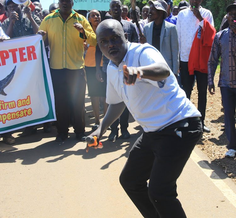 KUPPET Vice Chairman Peter Bett together with other officials during demonstration by Bomet Junior Secondary School teachers in Bomet town on May 13, 2024