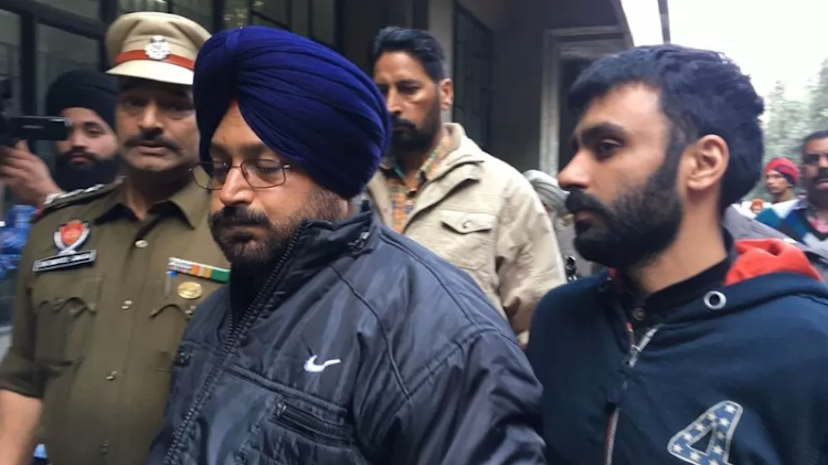 Jagtar Singh Johal (right) arrives at court in India in November 2017