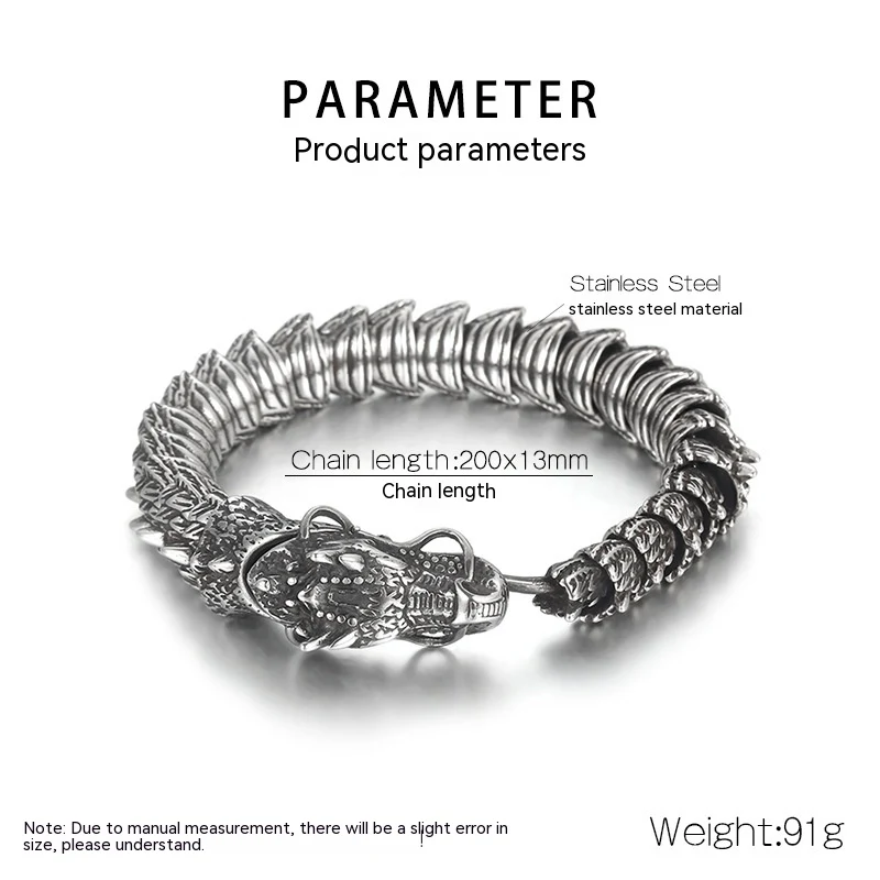 Vintage distressed zwarte titanium stalen heren drakenarmband met ingelegde groene ogen voor een stoere uitstraling.