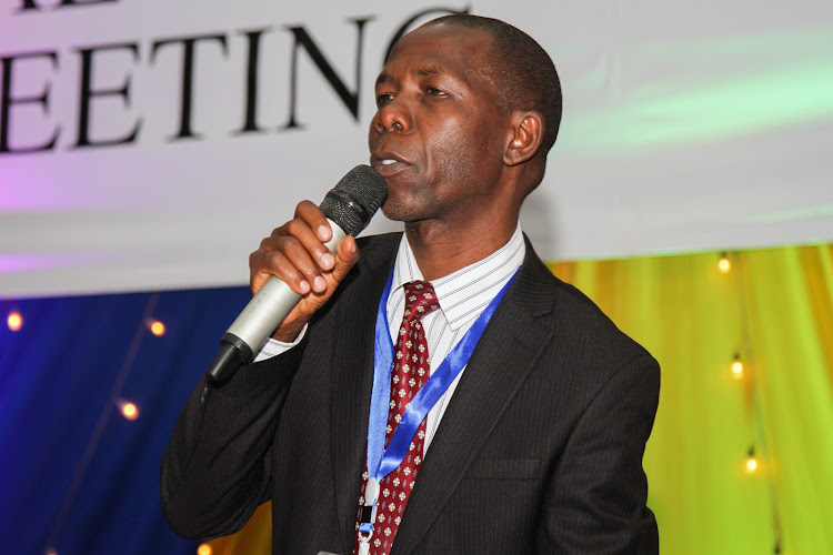 Stima Sacco Ceo Chris Useki addresses the Sacco delegates during the 46th Annual General Meeting(AGM) held recently in Nairobi