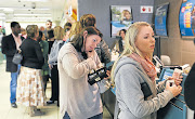 Members of the public queue at Computicket. The company has lost its appeal against a finding by the Competition Tribunal that led to a R20m administrative penalty.