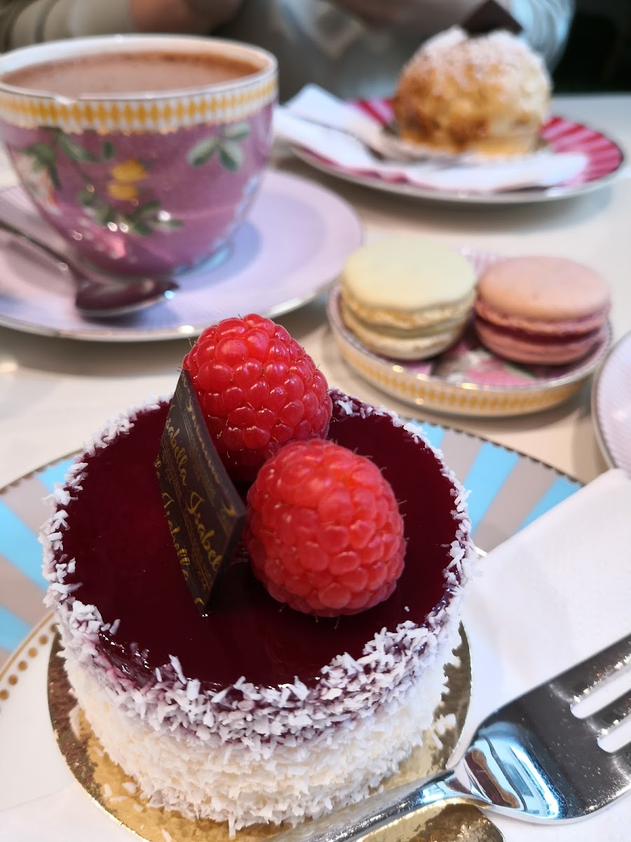 hot chocolate, cake and macarons