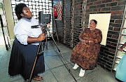 POLL SNAP: Identification photos are taken in KwaMashu township near Durban during special pensioners' votes for the 1994 election