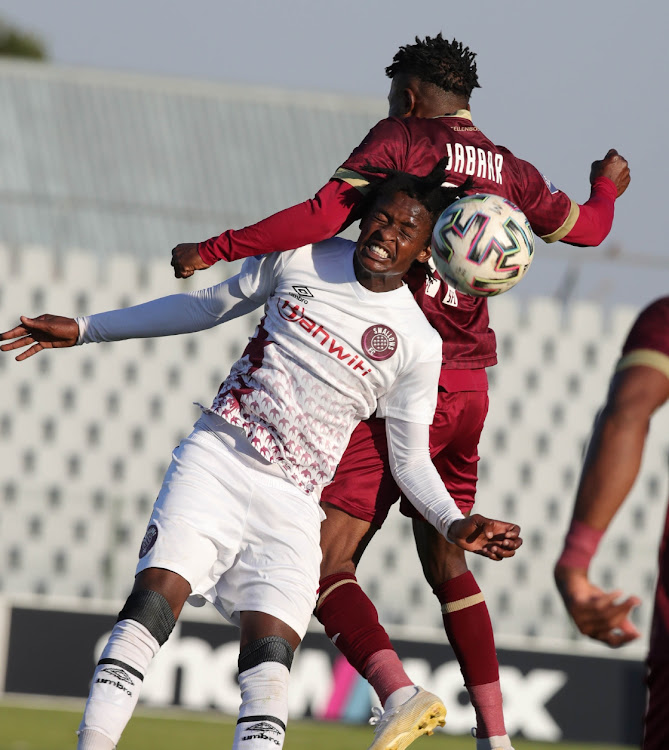 Given Moikhomotsi Thibedi of Swallows challenged by Ibraheem Jabaar of Stellenbotch FC during the DStv Premiership 2020/21 match between Swallows and Stellenbosch at Dobsonville Stadium, Johannesburg.