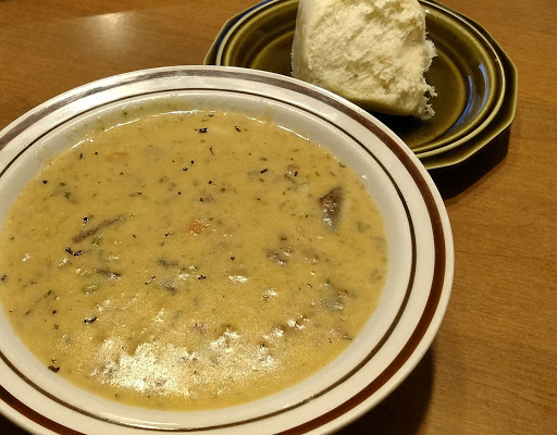 Loaded Potato Soup with a homemade roll.