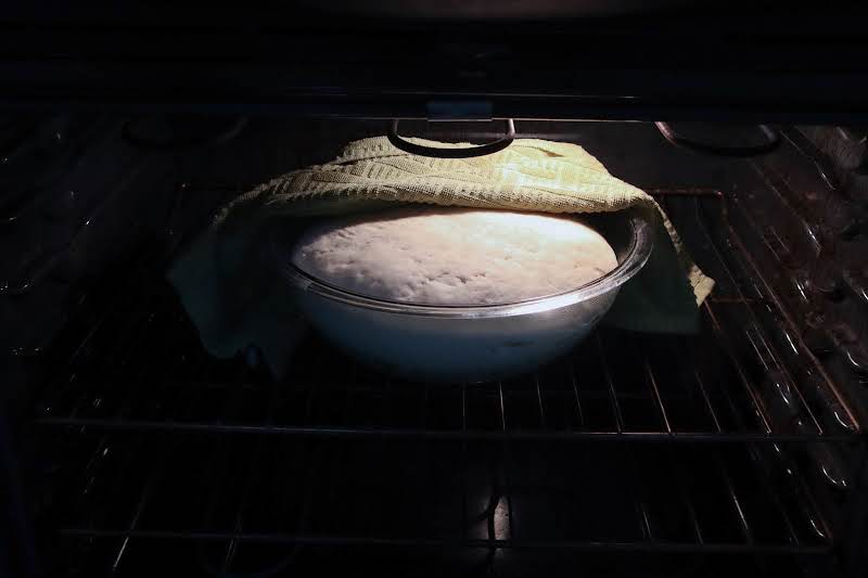 Dough Rising In A Greased Bowl.