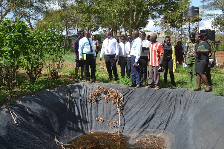 Members of the Kitui show revival committee visit a damaged water pool at the Kitui show ground on Wednesday.