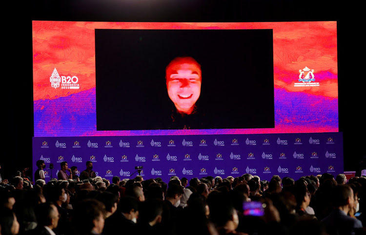 Elon Musk on the screen as he speaks virtually during the B20 Summit, ahead of the G20 leaders’ summit, in Nusa Dua, Bali, Indonesia, on November 14 2022. Picture: REUTERS/WILLY KURNIAWAN