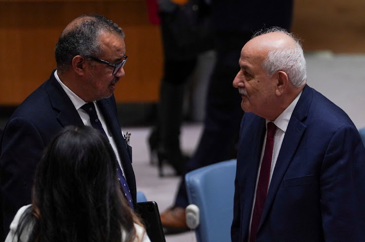 Riyad H. Mansour, Permanent Observer of Palestine, speaks with Director-General of the World Health Organisation (WHO) Dr. Tedros Adhanom Ghebreyesus, on the day of a meeting of the United Nations Security Council on the conflict between Israel and Hamas, at U.N. headquarters in New York, US, November 10, 2023.