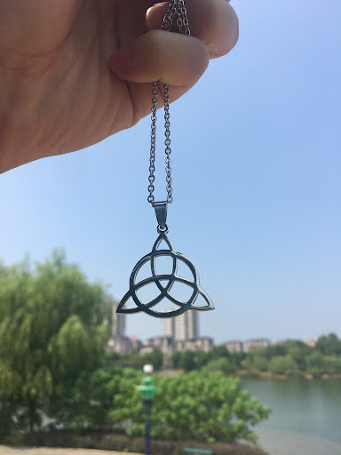 Title 7, Triangle pendant necklace