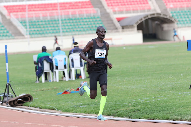 Mark Kiptoo competes in the men's 10,000m during the trials for the Africa Masters Championships at Nyayo Stadium.