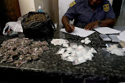 Drugs worth almost R100,000 were recovered from a suspected drug dealer in the Durban Point Road police station precinct on Thursday.  