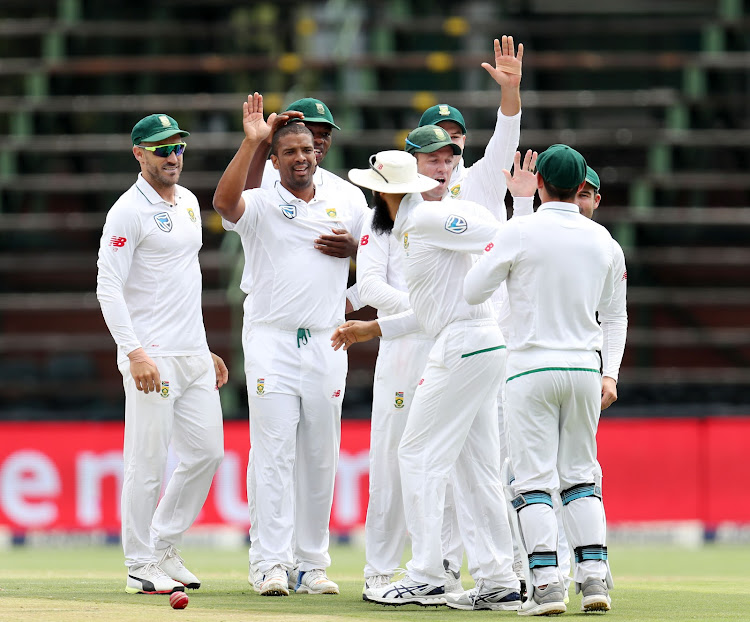 South Africa pace bowler Vernon Philander celebrates with teammates after wicketkeeper Quinton de Kock catches out Kannur Lokesh Rahul of India during the third and final test of the 2018 Sunfoil Test Series at Wanderers Stadium, Johannesburg South Africa on 24 January 2018. South Africa hold an unassailable 2-0 lead in the three-match test series.