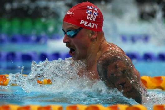 Adam Peaty in a past action.