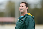 Head coach of South Africa Rassie Erasmus smiles during a South Africa Springboks Training Session at Churchie Grammar School on September 4, 2018 in Brisbane, Australia.