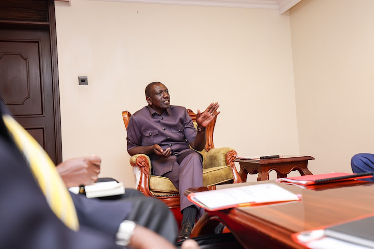 President William Ruto being briefed by Education CS Ezekiel Machogu and officials from the ministry on the KCSE 2023 results at State Lodge Eldoret on January 8, 2024