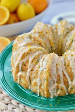 Zucchini Bundt Cake with Orange Glaze was pinched from <a href="http://www.momontimeout.com/2014/06/zucchini-bundt-cake-with-orange-glaze/" target="_blank">www.momontimeout.com.</a>