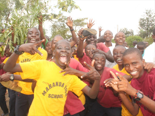 Maranda High School students celebrate obtaining a mean score of 10.67, up from last year's 10.5, in the 2015 Kenya Certificate of Secondary Education exam. Photo/MAURICE ALAL