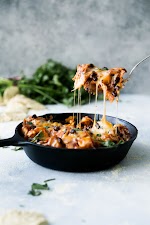 Butternut Squash and Black Bean Enchilada Skillet was pinched from <a href="http://www.ambitiouskitchen.com/2013/01/butternut-squash-and-black-bean-enchilada-skillet/" target="_blank">www.ambitiouskitchen.com.</a>