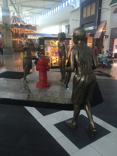 Children Around Hydrant Sculpture
